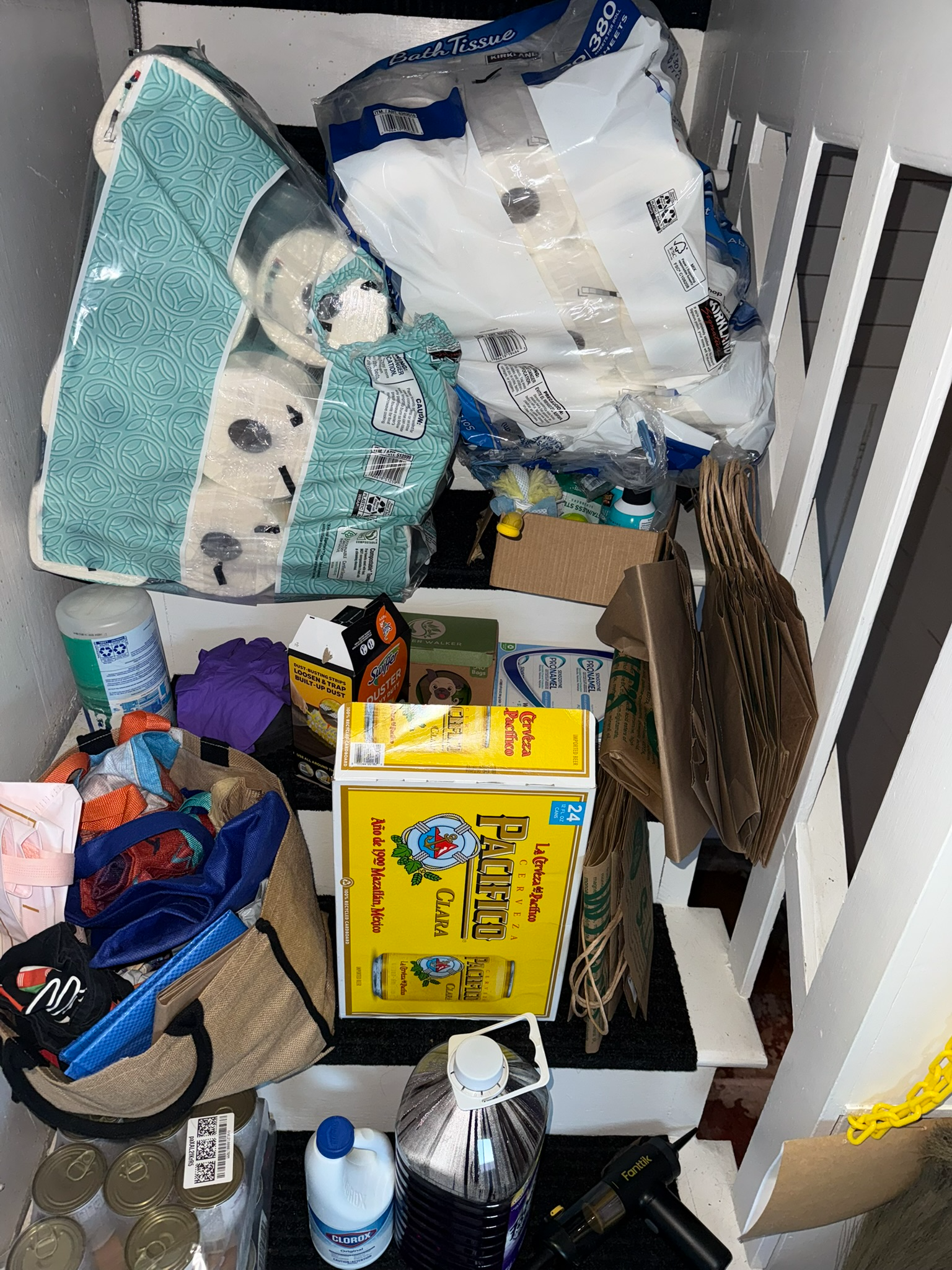 Cleaning supplies stored behind the back door
